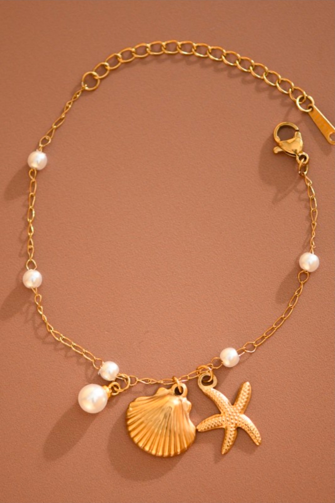 Beautiful bracelet with star and sea shell with pearly stone simulation 18K Stainless Stainless Steel bracelets, Stainless Steel Waterproof bracelets, without stain.